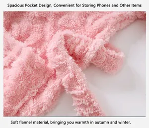 Pink flannel bathrobe detail shot showing soft fluffy texture and convenient matching tie belt.