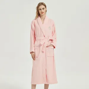 Soft cotton pink bathrobe for adults with belt and pockets, perfect for hotel or home use.