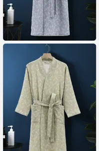 Detail view of cotton double gauze bathrobe with winter pattern, cozy and breathable fabric.