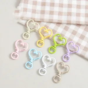 Colorful heart shaped swivel lobster clasps, cute metal keychain clips for DIY jewelry making crafts.