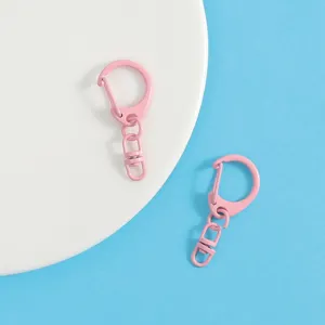 Pink metal keychain clasps, D-ring hardware charms for DIY handmade bags and accessories.