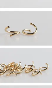 Gold metal spiral jump rings connectors for DIY jewelry making and handmade craft accessories.