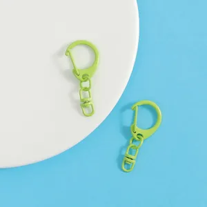 Green zinc alloy keychain detail, cute candy color D ring swivel clasp hardware.