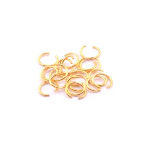 Gold open jump rings metal jewelry findings connecting ring components for DIY crafts.