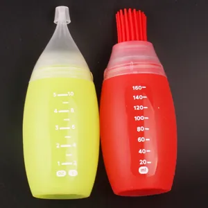 Silicone BBQ oil bottle set with measurement scales, squeeze seasoning dispenser for kitchen cooking.