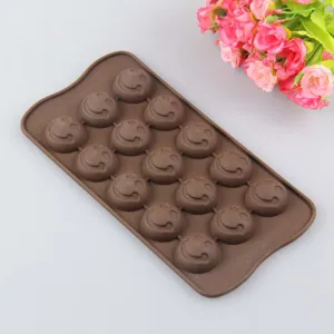 Brown silicone chocolate mold with cute smiley face cavities for DIY baking and ice making.