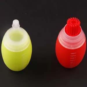 Silicone BBQ oil brush bottle set with volume scale, convenient kitchen seasoning dispenser.