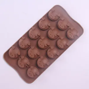 Brown silicone chocolate mold featuring cute pig face expressions for DIY baking and ice cubes.