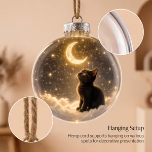Detailed view of transparent holiday ornament ball with starry night cat design and hemp cord.