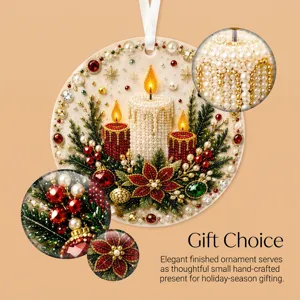 Close-up detail view of round diamond painting Christmas ornament with glittering pearls and candles.