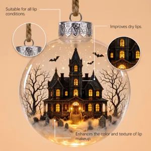Transparent ball hanging ornament with Halloween haunted house miniature inside for holiday decor.