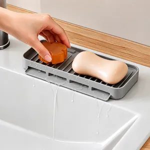 Porte-savon égouttoir en silicone pour cuisine et salle de bain, support antidérapant séchage rapide.