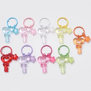 Colorful transparent heart keychain with star charm, cute DIY resin bag pendant accessory.