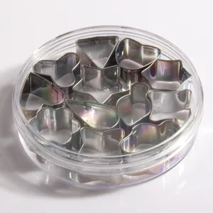 Stainless steel cookie cutter set detail showcasing various shapes packed in a clear round box.