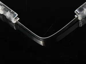 Close-up detail of the transparent plastic food tong hinge, clear and durable design.