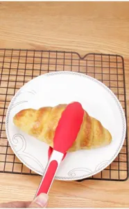 Stainless steel kitchen food tong detail, high temperature resistant silicone food clamping tool.