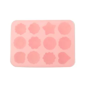Pink 12-cavity silicone mold for jelly, chocolate, pudding, and home baking tools.