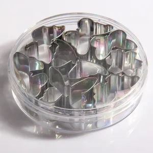 Stainless steel cookie cutter set with various animal and geometric shapes in a clear box.