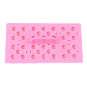Moule à fondant en plastique rose avec poignée pour pâtisserie découpe de grille détail