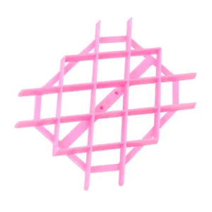 Moule en plastique rose pour fondant et biscuits avec motif de grille géométrique outil.
