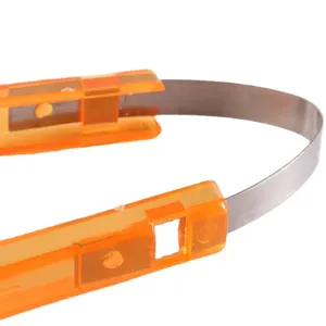 Orange plastic and stainless steel food tong, ideal for baking, BBQ, and kitchen use.