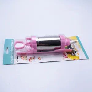 Pistola per decorare in acciaio inossidabile con parti in plastica rosa in blister per dolci.