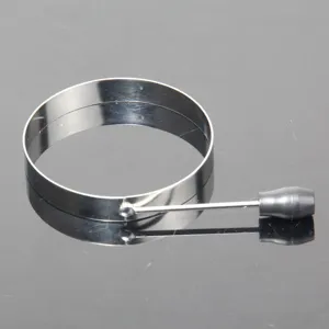 Stainless steel egg ring detail shot, showing the smooth metallic surface and handle structure.