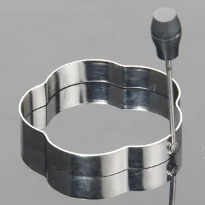 Stainless steel flower shaped egg ring detail shot, durable kitchen tool for frying eggs.