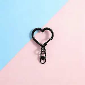Black heart-shaped metal lobster clasp keychain accessory for DIY jewelry and bag pendants.