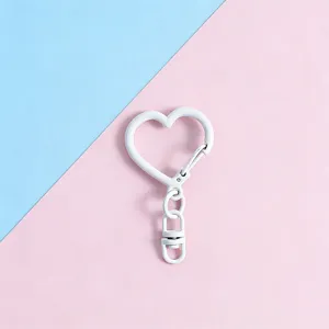 White heart-shaped keychain metal clasp DIY accessory detail view showing smooth finish.