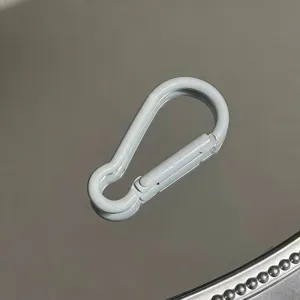White aluminum alloy carabiner keychain hook detail view, smooth metal finish close-up.