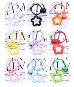 Colorful star keychain with bell, multi-color metal ring pendant for bags and keys.