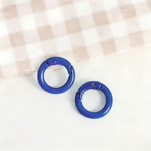 Blue zinc alloy spring ring snap hooks for DIY handmade jewelry and bag keychains accessories.