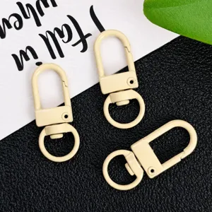 Zinc alloy swivel snap hooks, beige bag hardware clasps, DIY keychain detail view.