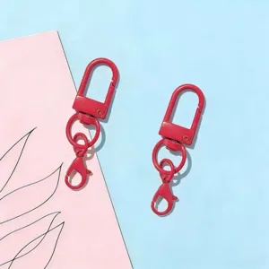 Red zinc alloy swivel keychain clasps DIY hardware accessories for bags and keyrings.