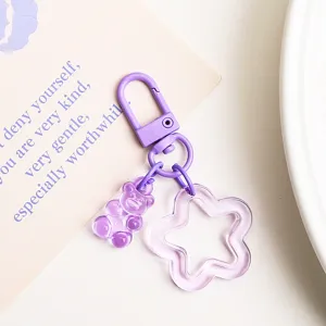 Lila transparenter Bär Stern Schlüsselanhänger Detail, perfekte Tasche und Kopfhörer Etui Deko.