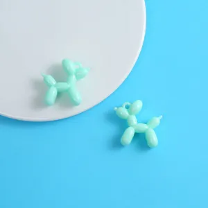 Close-up detail of mint green acrylic balloon dog charm, perfect for DIY keychain and phone straps.