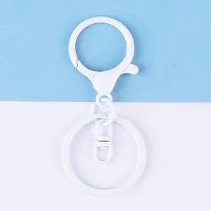 White metal lobster clasp keychain accessory detail, durable painted metal hardware for DIY crafts.