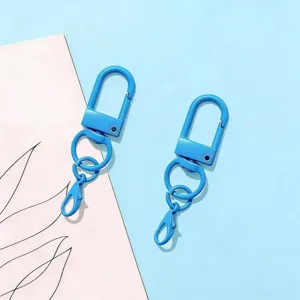 Close up of blue zinc alloy swivel keychain lobster clasp hardware DIY accessory