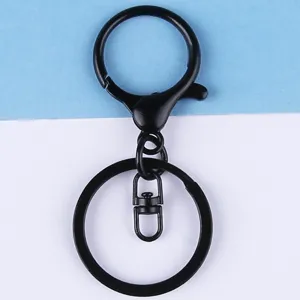 Black metal lobster clasp keychain hardware detail shot, ideal for DIY crafts and accessories.