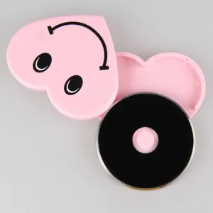 Stainless steel pizza cutter roller with cute pink heart case for easy kitchen baking.