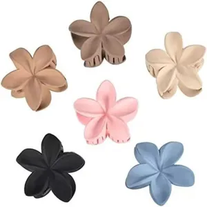 Detail shot of matte frangipani hair claw, multi-color floral styling accessory for daily wear.