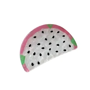 Dragon fruit hair claw clip detail, cute fruit design shark clip for half up hairstyles.