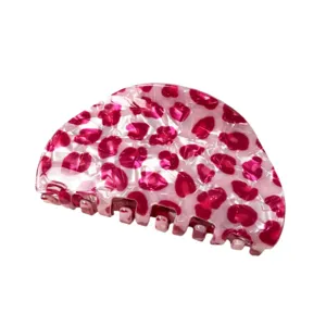 Pink leopard print hair claw clip detail, cute acetate shark clip for half updo styles.