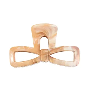 Elegant marble pattern bow hair claw clip, vintage amber acrylic shark clip for daily chic hair.