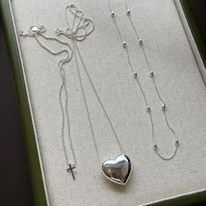 Zilveren hart hanger gelaagde ketting set met kruis en kralen details, elegante damessieraden