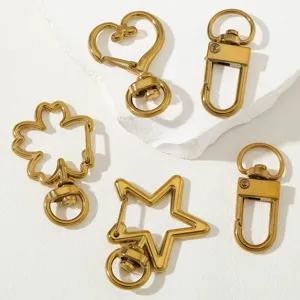 Moschettoni girevoli dorati in acciaio inox, forme a cuore e stella per borse e bracciali.