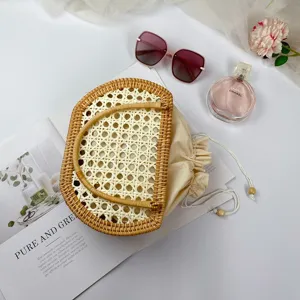 Borsa a mano rotonda in rattan intrecciato vintage francese con sacca in tela coulisse borsa mare