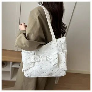 Borsa a tracolla in tela vintage y2k da donna con fiocco e stelle, grande capienza.