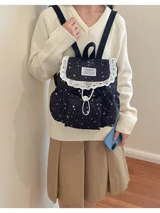 Sac à dos noir motif étoile avec bordure en dentelle blanche, sac de jour élégant femme.